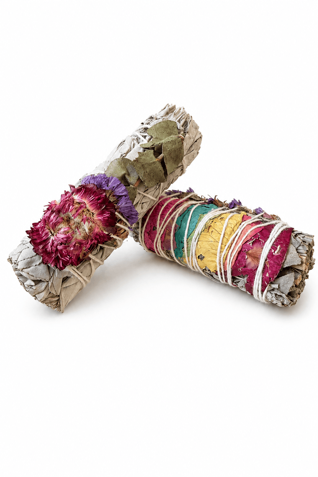 Sacred Light Soundbaths and Crystals floral sage bundle for smudging, with fresh green leaves and dried white flowers.