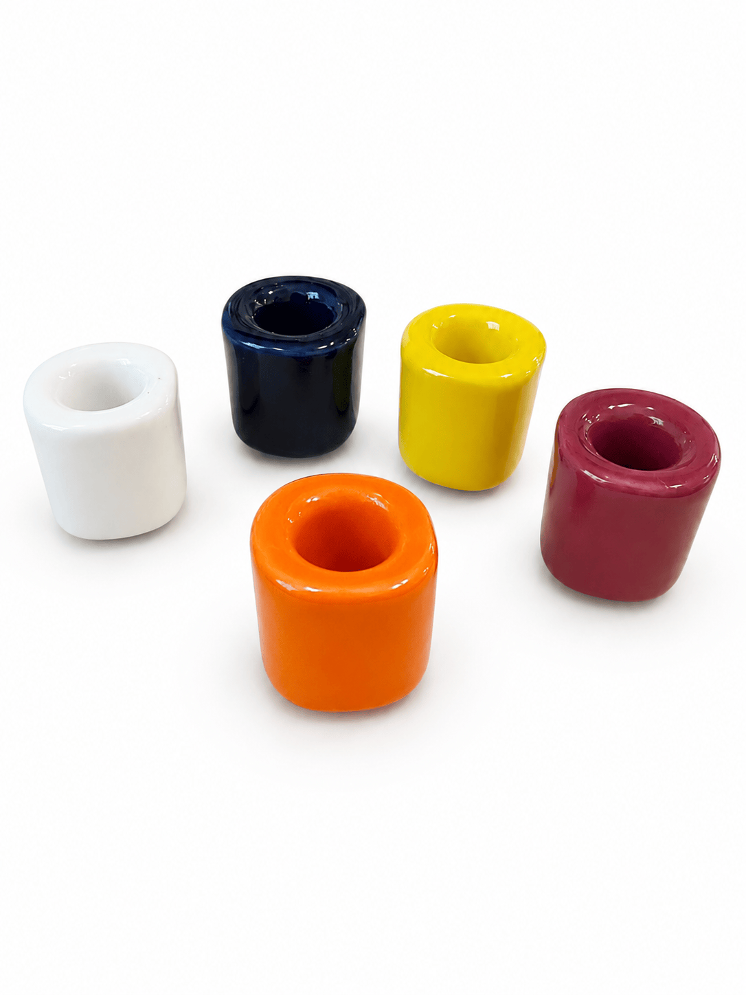 Sacred Light Soundbaths and Crystals ceramic candle holders with intricate designs and a warm, rustic finish.