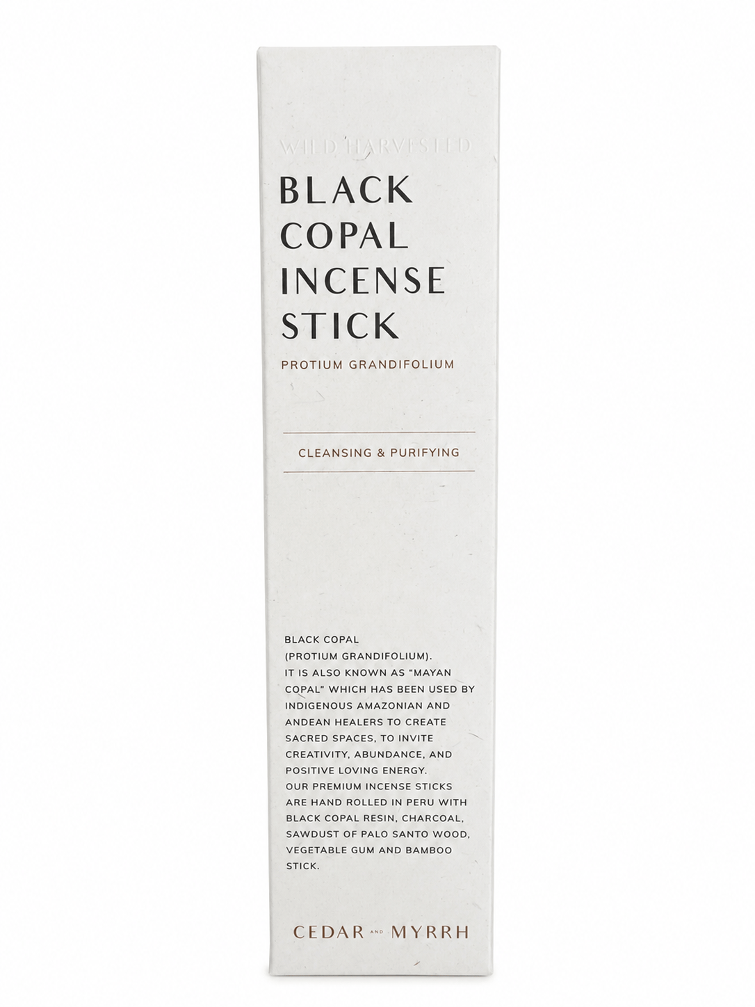Black Copal incense sticks from Sacred Light Soundbaths and Crystals, displayed in a natural setting with incense holder.