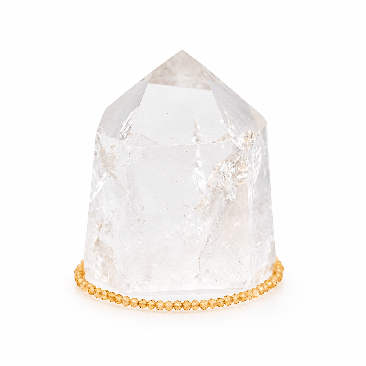 Dainty bracelet with faceted Grade AAA Citrine stones by Milk and Honey, showcasing a delicate design and vibrant orange-yellow color.