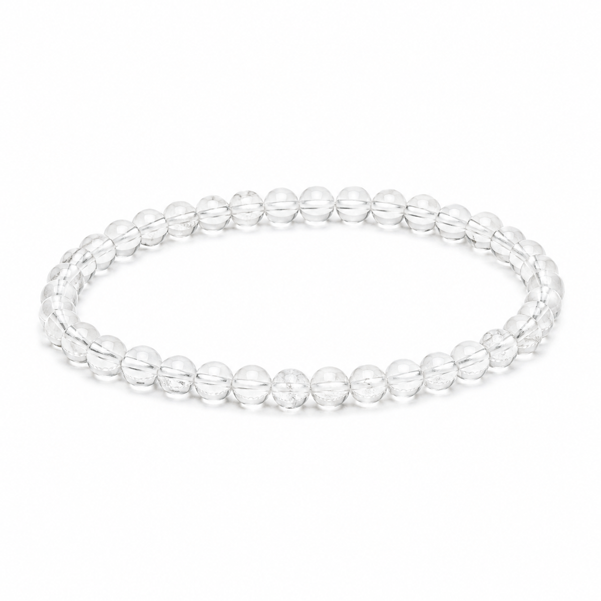 Delicate clear quartz bracelet from Milk and Honey jewelry collection featuring small, polished quartz beads on a fine elastic band.