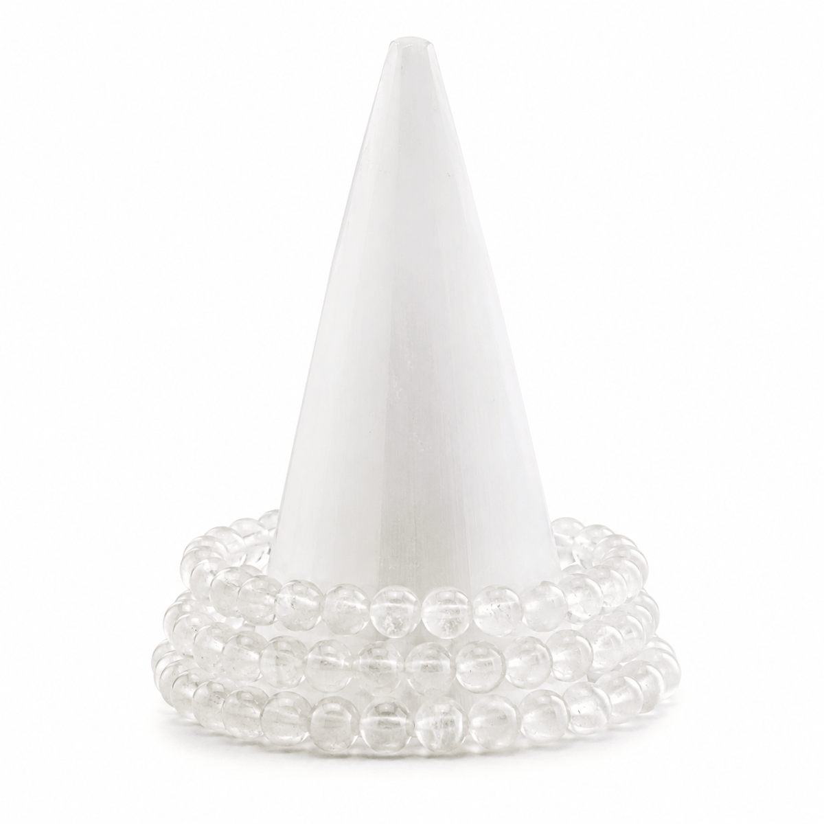 Medium clear quartz bracelet with smooth, polished beads, designed by Milk and Honey, showcasing elegant jewelry craftsmanship.