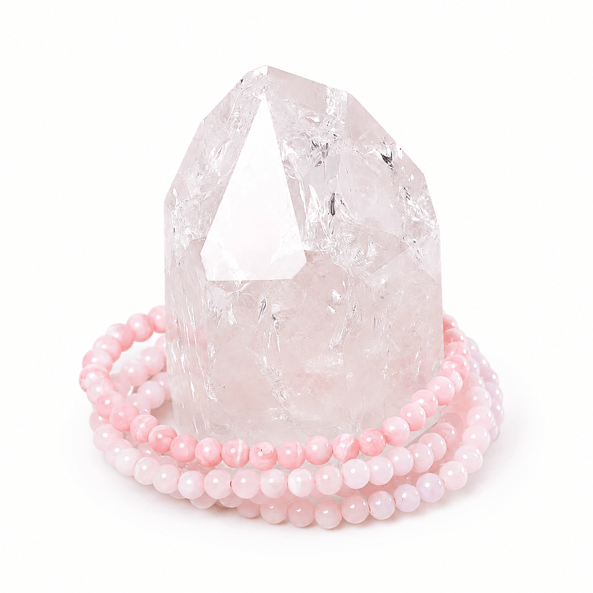Dainty pink opal bracelet by Milk and Honey featuring smooth pink opal beads on a delicate jewelry chain.