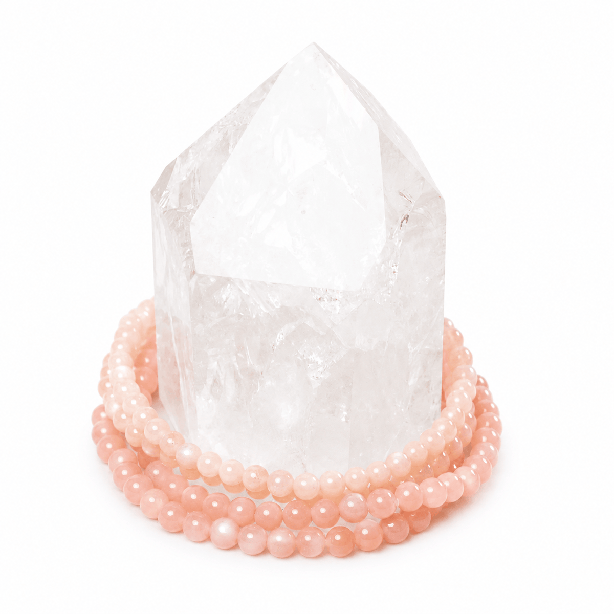 Dainty peach moonstone bracelet by Milk and Honey featuring smooth, polished moonstone beads on a delicate jewelry bracelet.