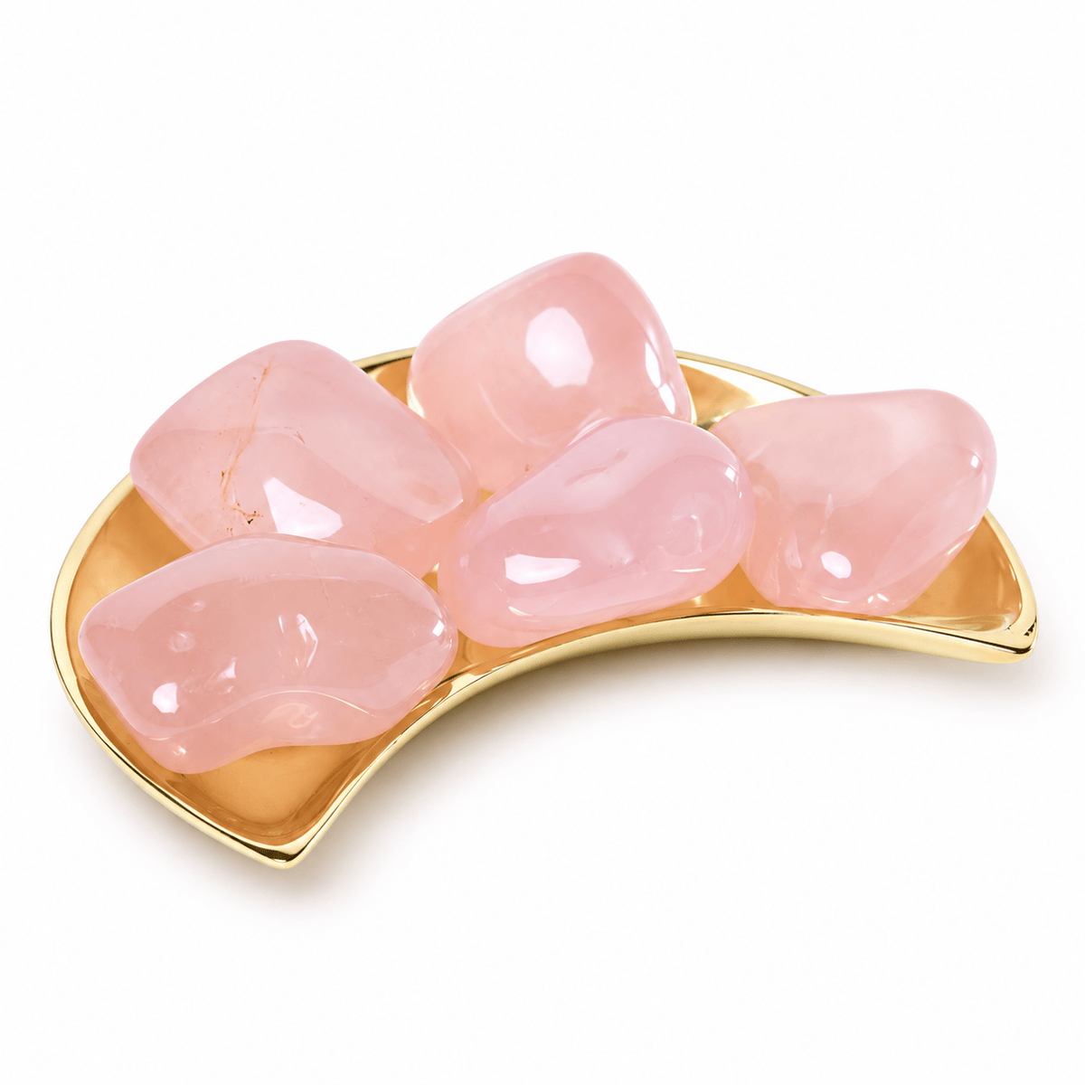 Pink chalcedony stone from Sacred Light Soundbaths and Crystals, showing smooth, tumbled pink quartz with a glossy finish.