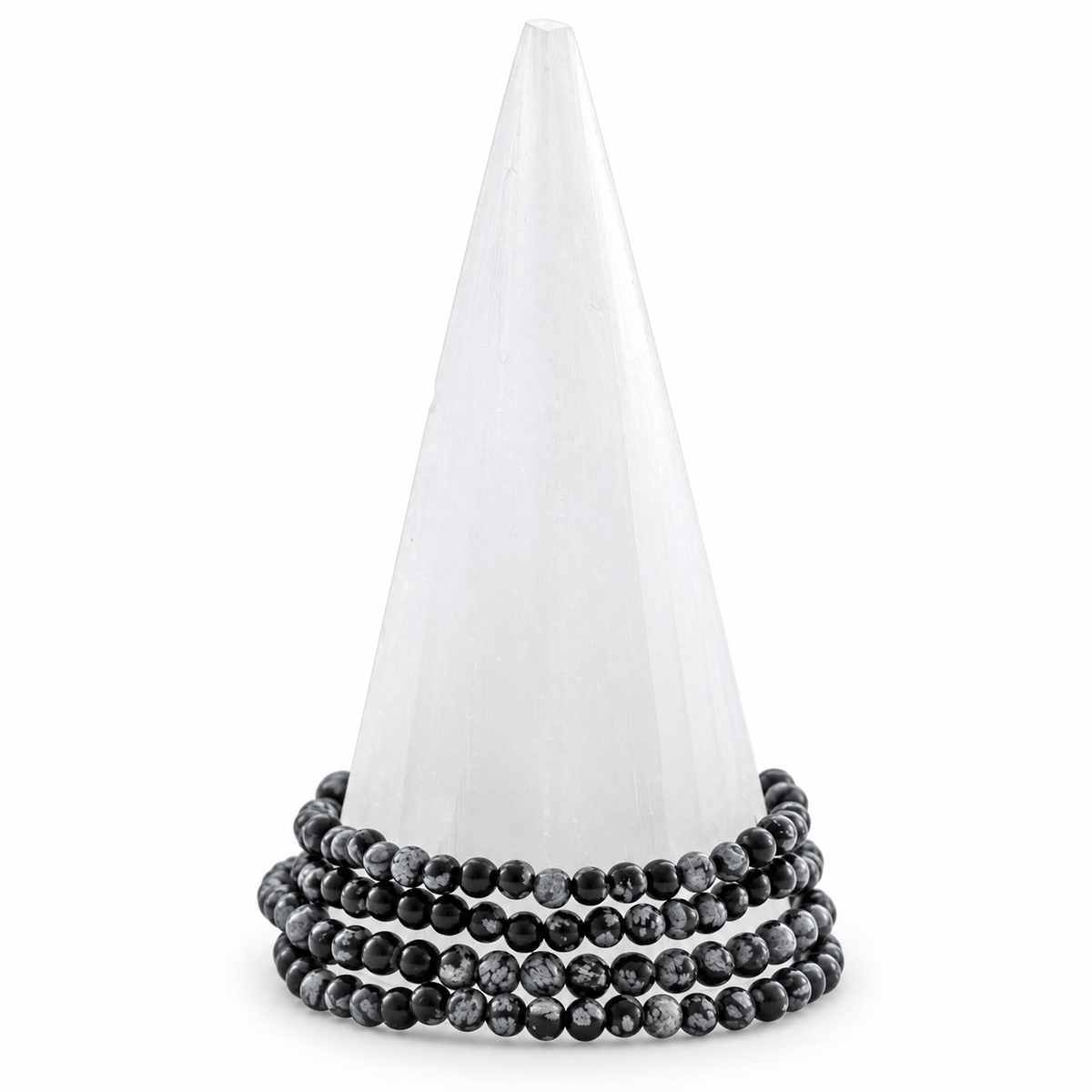 Dainty Snowflake Obsidian bracelet featuring black volcanic stone beads with white snowflake patterns, from Milk and Honey jewelry.