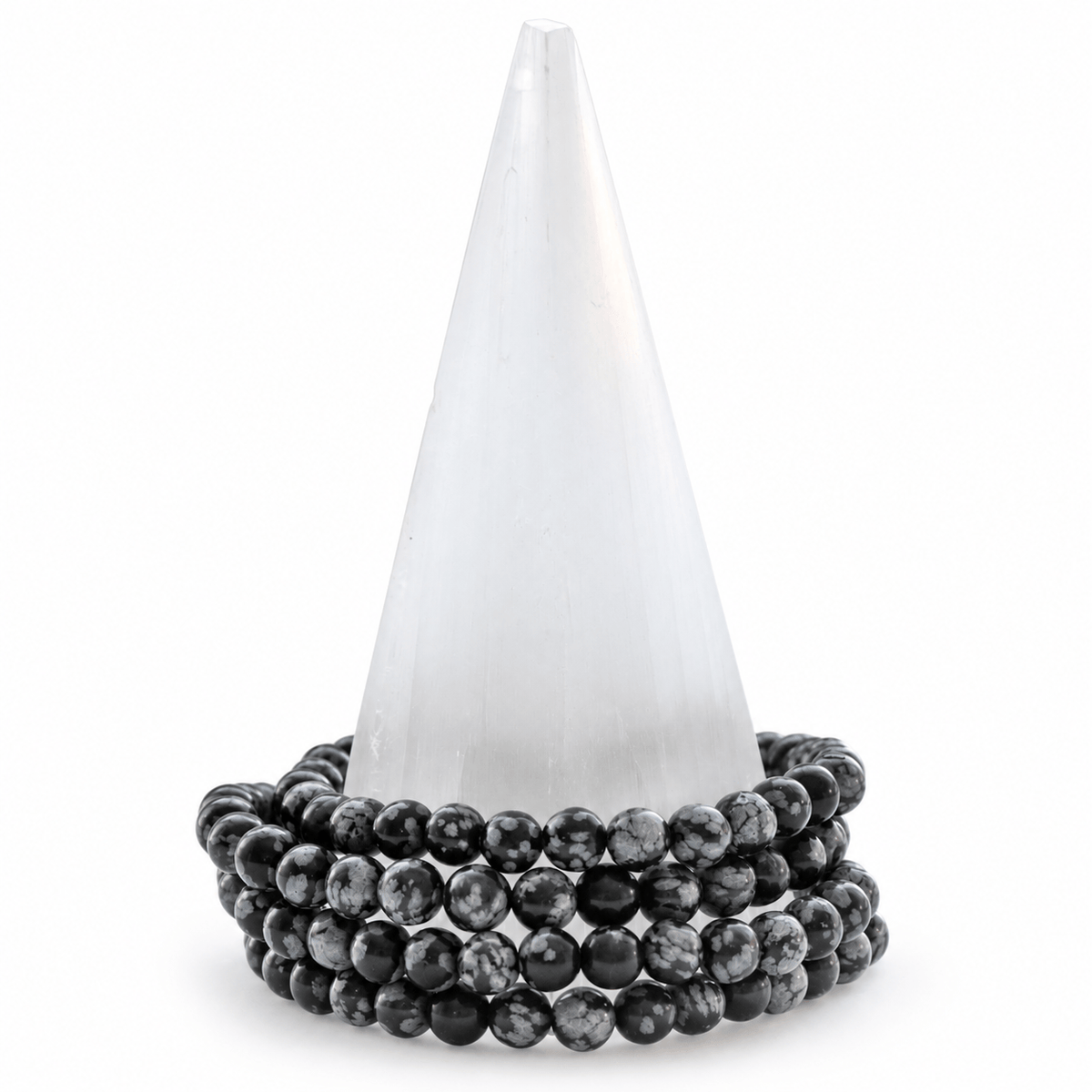 Medium Snowflake Obsidian bracelet by Milk and Honey featuring black beads with white snowflake patterns on a jewelry strand.