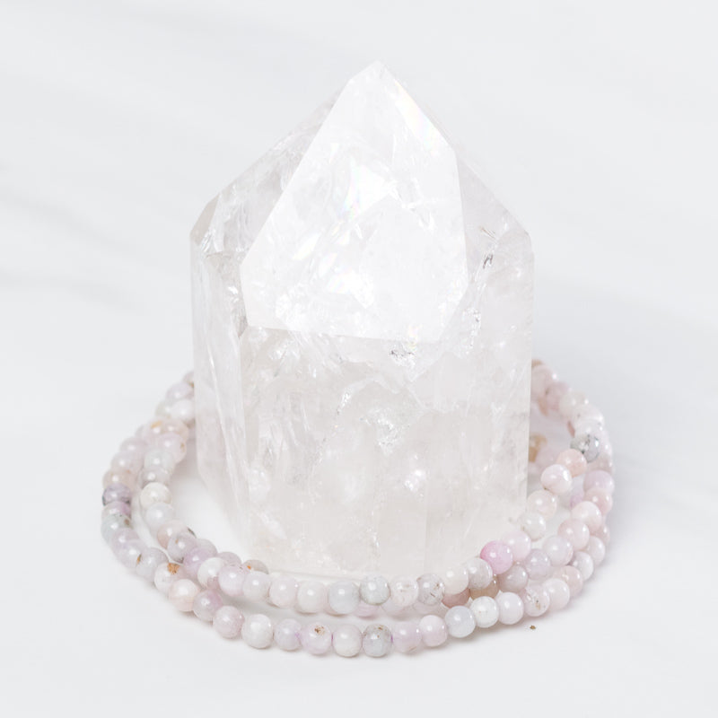 Dainty Kunzite bracelet by Milk and Honey featuring pastel pink gemstone beads and delicate silver chain.