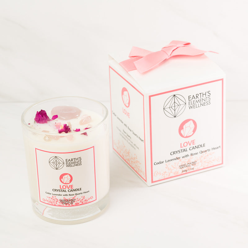 Aromatherapy Love Candle from Sacred Light Soundbaths and Crystals, featuring a soft glow and soothing wax design.