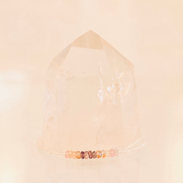 Dainty jewelry bracelet featuring Grade AAA white topaz and multi-faceted sapphire rondels by Milk and Honey.