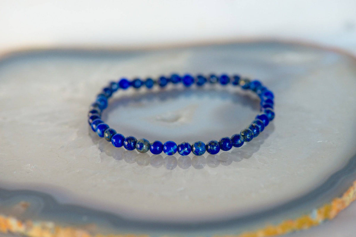 Lapis Lazuli dainty bracelet from Milk and Honey featuring small blue gemstone beads and a delicate silver clasp.