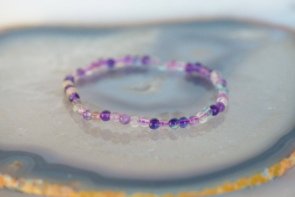 Dainty fluorite bracelet from Milk and Honey jewelry collection featuring polished purple and green fluorite stones on a delicate chain.