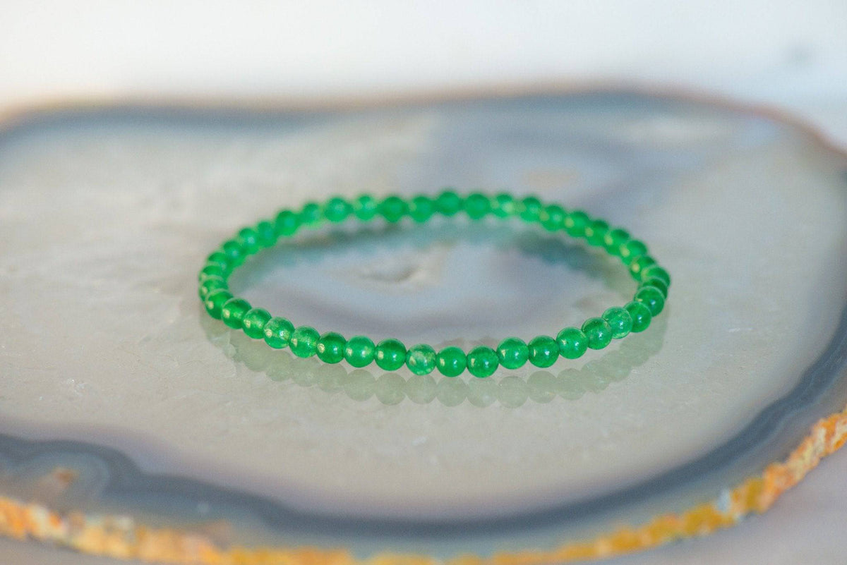 Green Aventurine dainty bracelet featuring small, polished green stones and a delicate silver chain, designed by Milk and Honey.