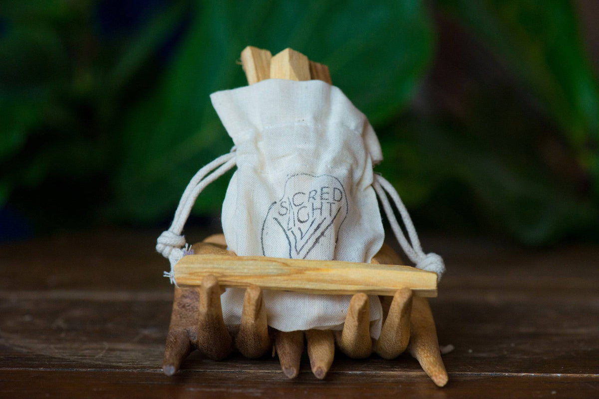 Sacred Light Soundbaths and Crystals Palo Santo Trio Pack of smudge sticks, natural incense for cleansing and spiritual rituals.