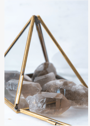 Smoky Quartz point crystal from Sacred Light Soundbaths and Crystals, featuring a polished, natural stone with smoky gray coloration.