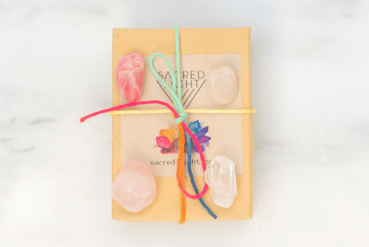 Sacred Light Soundbaths and Crystals Love Gem Stone Set featuring colorful polished gemstones on a white background.