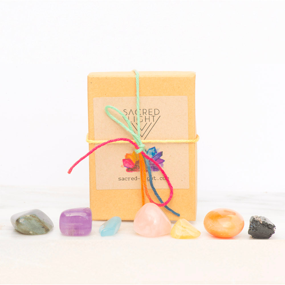 Small chakra gemstone set featuring colorful crystals for chakra alignment by Sacred Light Soundbaths and Crystals.