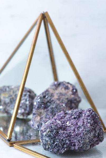 Natural Lepidolite crystal cluster with purple and gray tones, showcasing its layered mineral structure and sparkling surface.