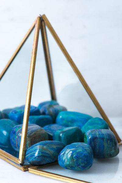 Tumbled Azurite Malachite crystal from Sacred Light Soundbaths and Crystals, showing vibrant blue and green mineral patterns.