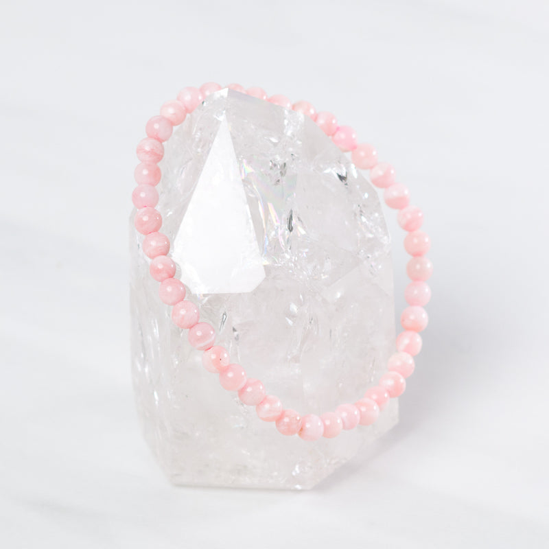 Pink opal dainty bracelet from Milk and Honey featuring polished pink opal beads on a delicate jewelry design.