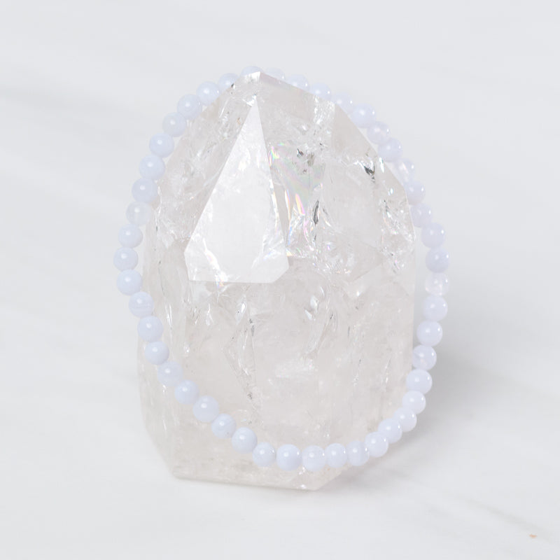 Dainty blue chalcedony bracelet by Milk and Honey featuring smooth, polished stones on a delicate jewelry chain