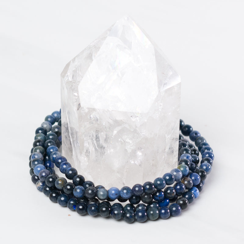 Dumortierite dainty bracelet with blue gemstone beads and silver clasp, elegant jewelry piece by Milk and Honey.