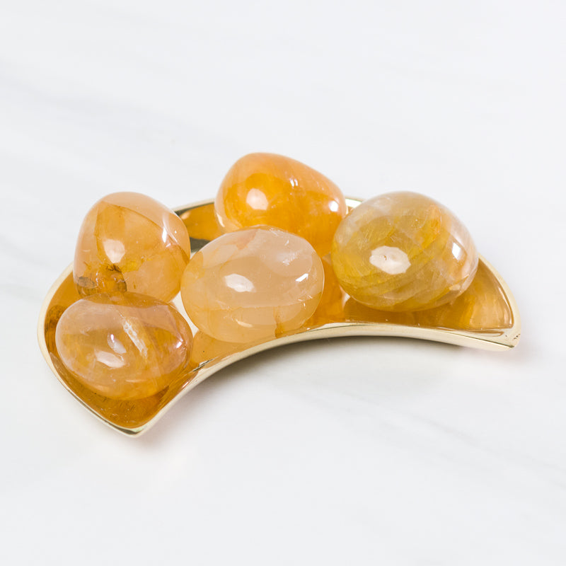 Golden Hematoid Quartz "Golden Healer" crystal from Sacred Light Soundbaths and Crystals, showing its rich golden and reddish mineral details.