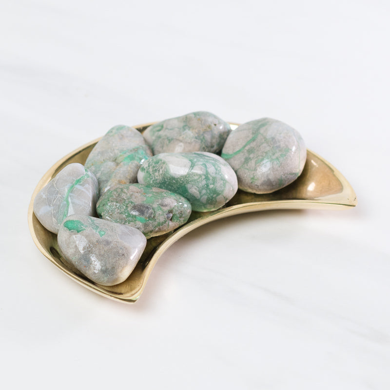 Variscite stone from Sacred Light Soundbaths and Crystals, showcasing its vibrant green and blue hues with a smooth polished surface.
