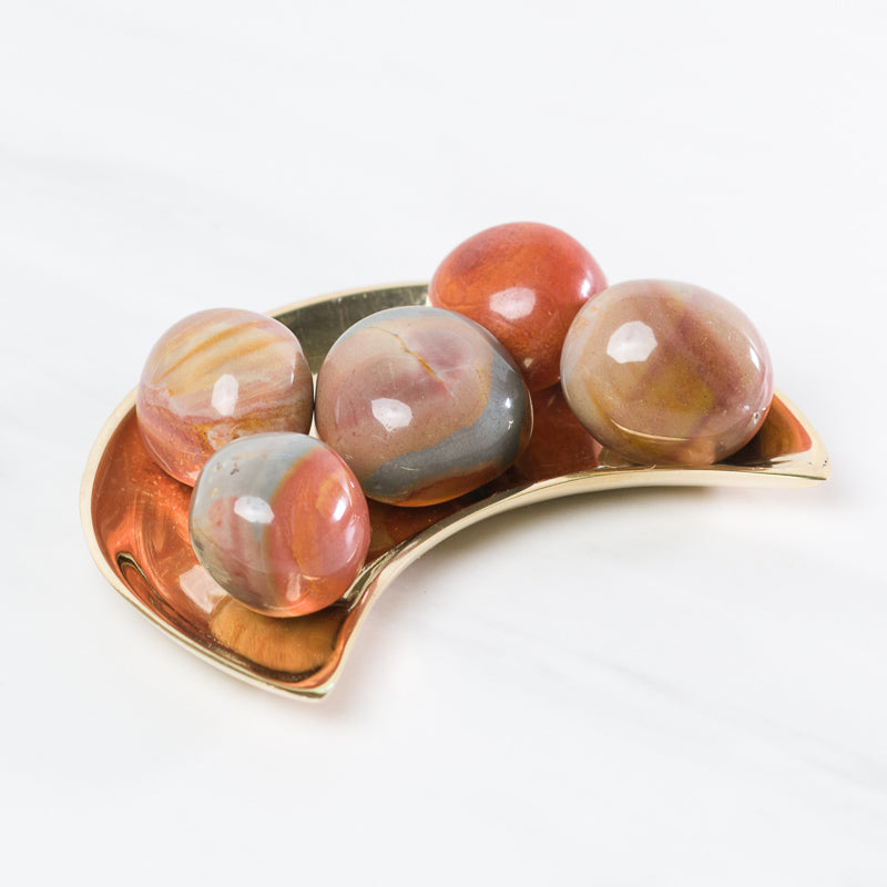 Polychrome Jasper stone from Sacred Light Soundbaths and Crystals, showcasing vibrant multicolored patterns and polished surface.
