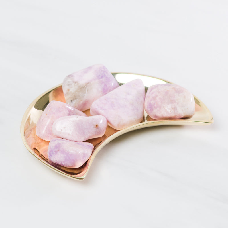 Sacred Light Soundbaths and Crystals Prairie Tanzanite stones with rich blue-violet hues and natural crystal formations.