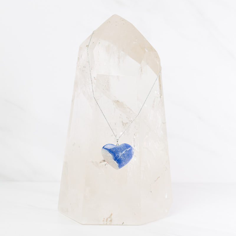 Blue aventurine heart necklace on sterling silver chain from Sacred Light Soundbaths and Crystals, showcasing a polished gemstone pendant.