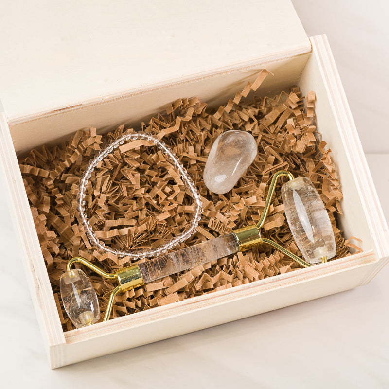 Sacred Light Soundbaths and Crystals Clear Quartz face massage roller gift set with soothing facial massage accessories.