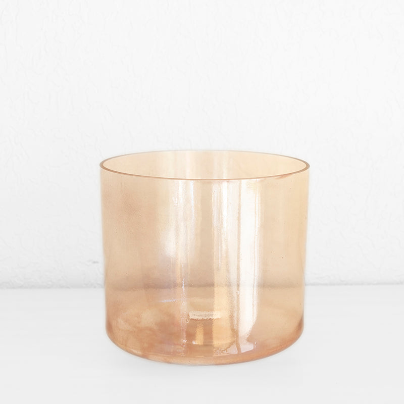 9-inch Morganite Palladium Alchemy Crystal Singing Bowl by Crystal Tones, showcasing the translucent pink bowl on a wooden stand.