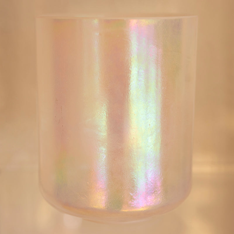 7-inch Phenacite Platinum Alchemy Crystal Singing Bowl by Crystal Tones with tall flat base, showcasing its intricate design and shimmering surface.
