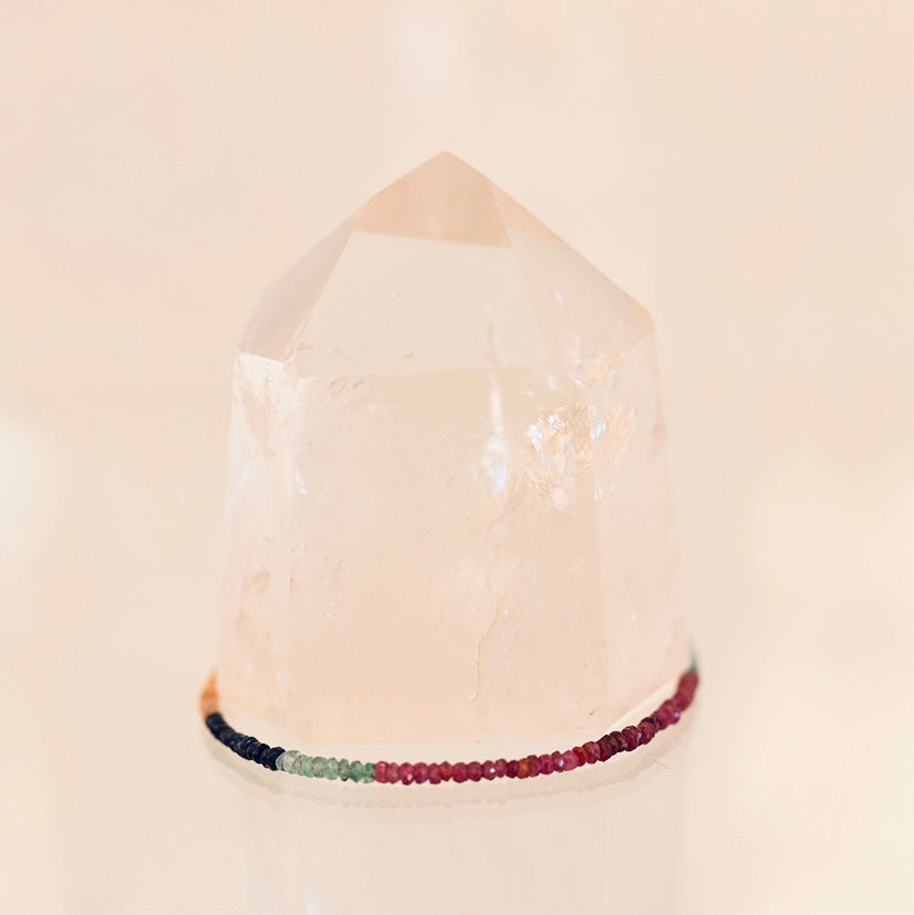 Dainty bracelet featuring multi-faceted Grade AAA sapphires from Milk and Honey, elegant jewelry with sparkling blue stones.