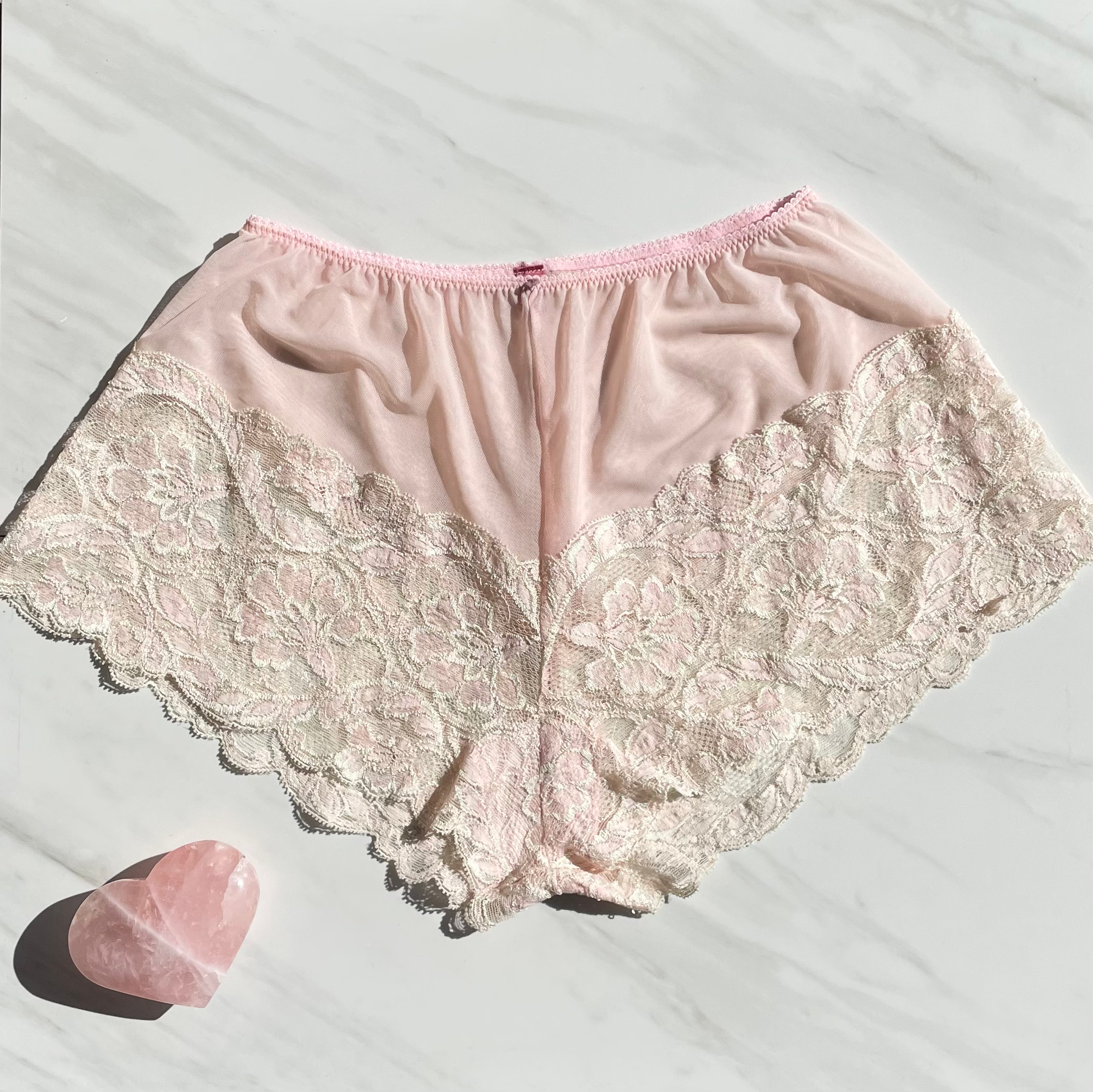 Limited edition Goddess Pink French lace underwear with ruby gem embellishments by Sacred Light for a luxurious, delicate look.
