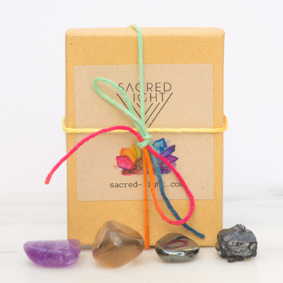 Sacred Light Soundbaths and Crystals Protection Gem Stone Set featuring various polished gemstone pieces on a neutral background.
