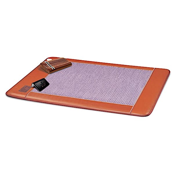 Biomat Queen Biomat 7000MX infrared therapy mat with plush cover, designed for full-body relaxation and pain relief.