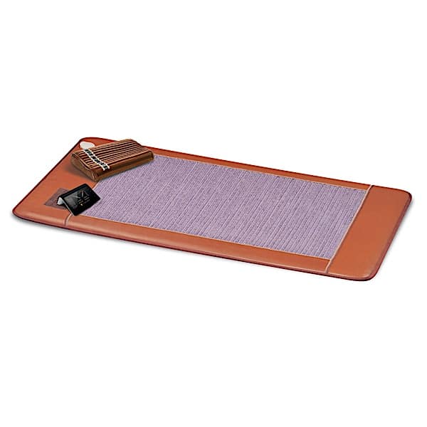 Single Biomat® 7000MX infrared therapy mat by Biomat, showcasing its plush surface and control panel for wellness treatment.