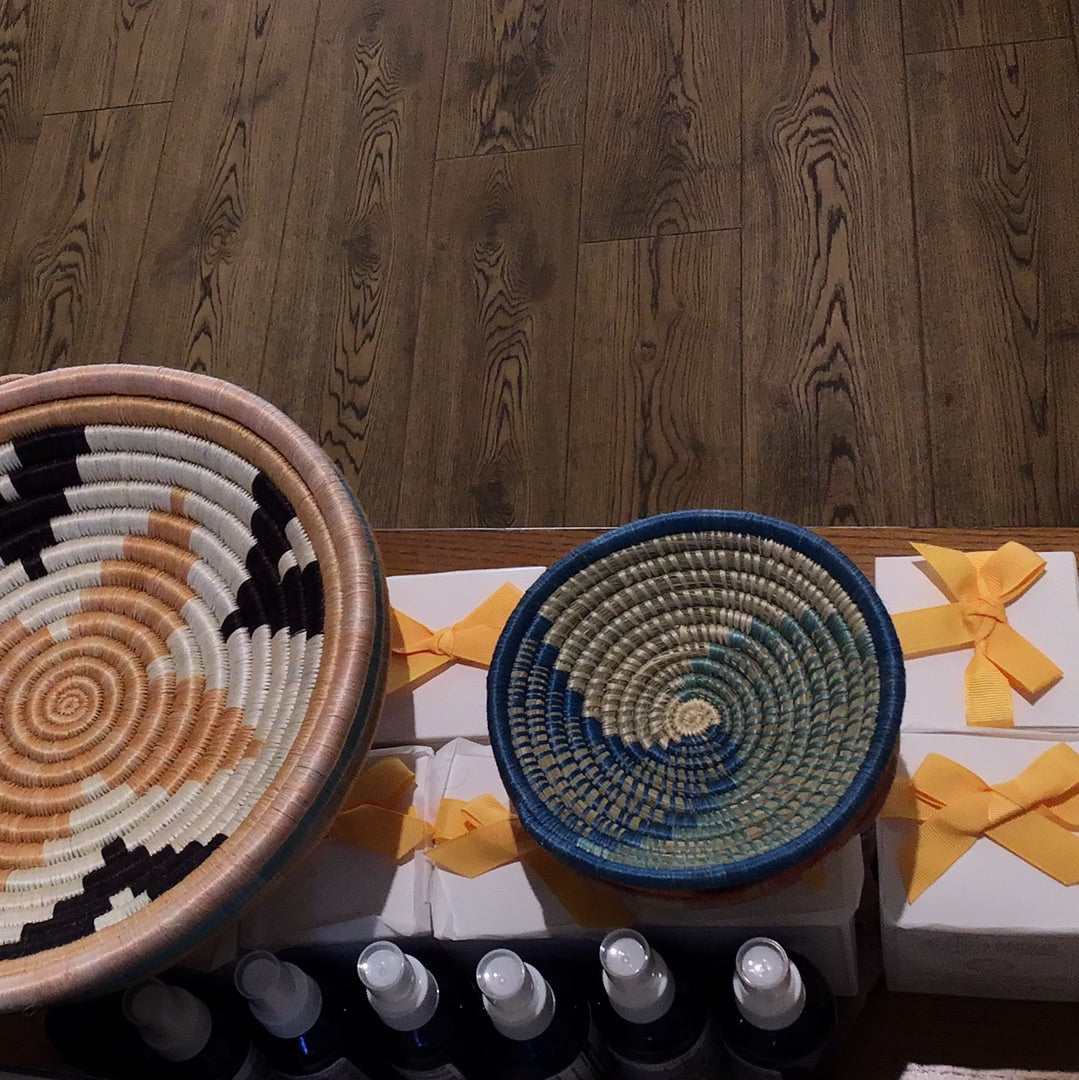 Woven African bowls from Sacred Light Soundbaths and Crystals, featuring intricate patterns and natural handcrafted details